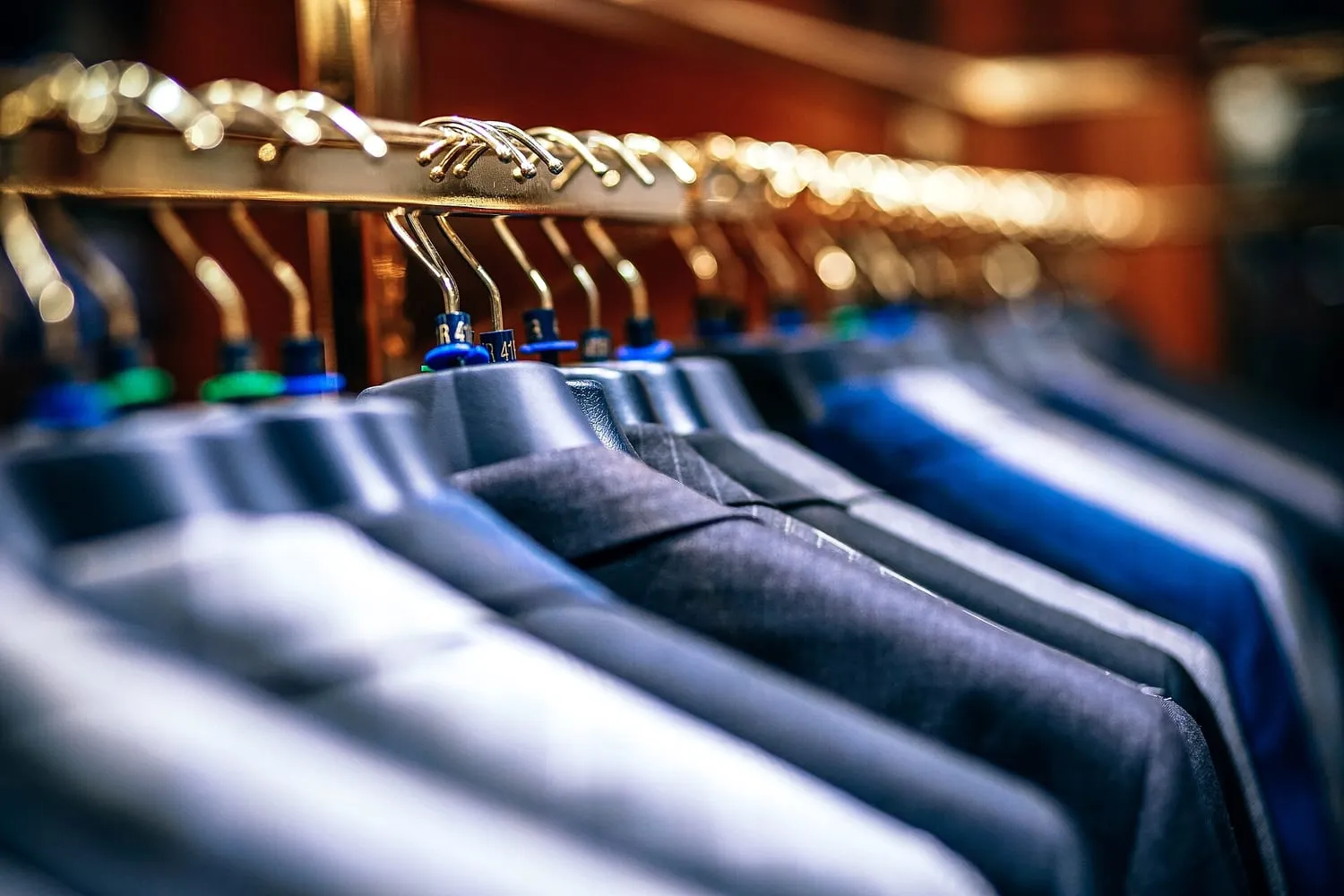 Blazer jackets hanging on a rail